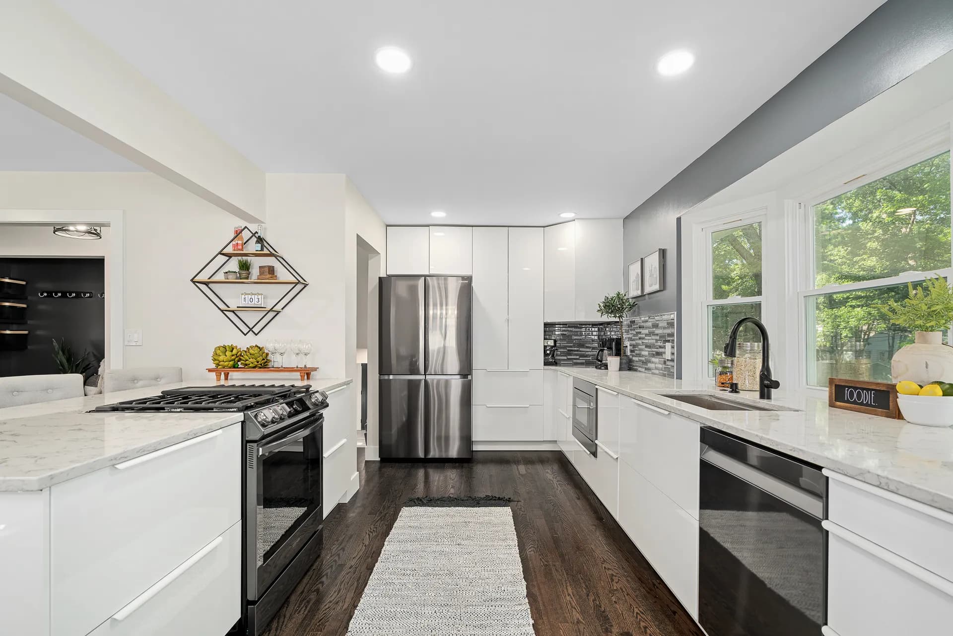 Kitchen remodeling project with updated cabinets and finishes