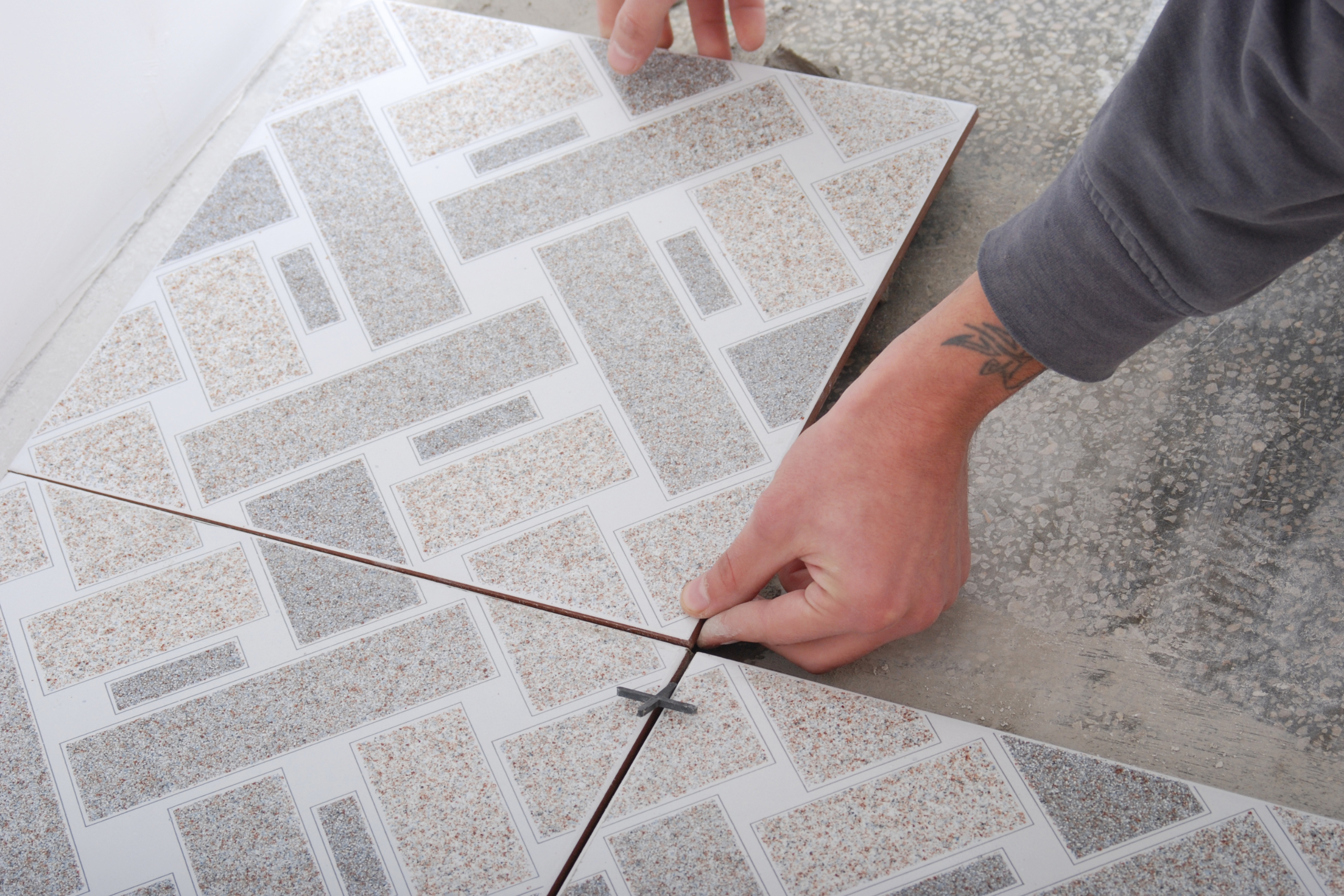 person-install-tile-floor
